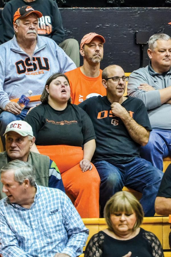 Susan Melero (left and John Tripp (right) have been attending Oregon State athletic events together for seven years. There regular spot is in section 17 behind OSU’ basket.