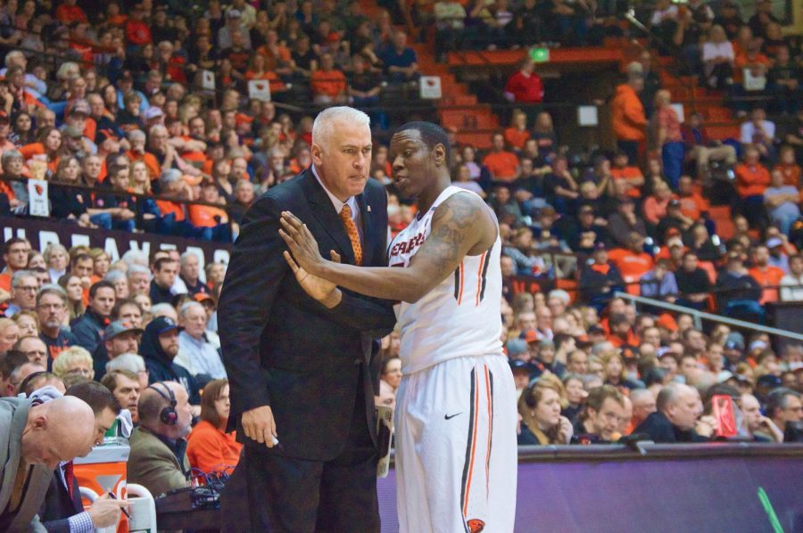 Senior forward Jarmal Reid and head coach Wayne Tinkle meet during Oregon State’s game against Cal on Jan. 9. Reid is eligible to play on Thursday after serving his four-game suspension for tripping a referee against Utah on Jan. 17. 