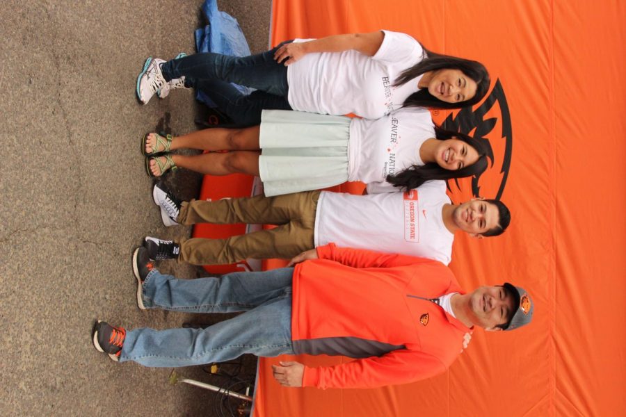 Laurie, Amber, Evan and Marvin Yonamine pose at a tailgate before the Idaho State vs OSU football game. Yonamine has worn Beaver gear every day for over 5,700 days straight.