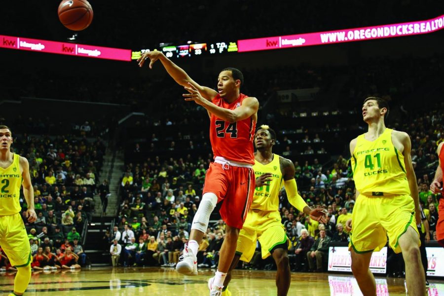 Guard Kendal Manuel dishing out a pass in the first meeting against rival University of Oregon earlier this season. Manuel has 47 assists this season. 