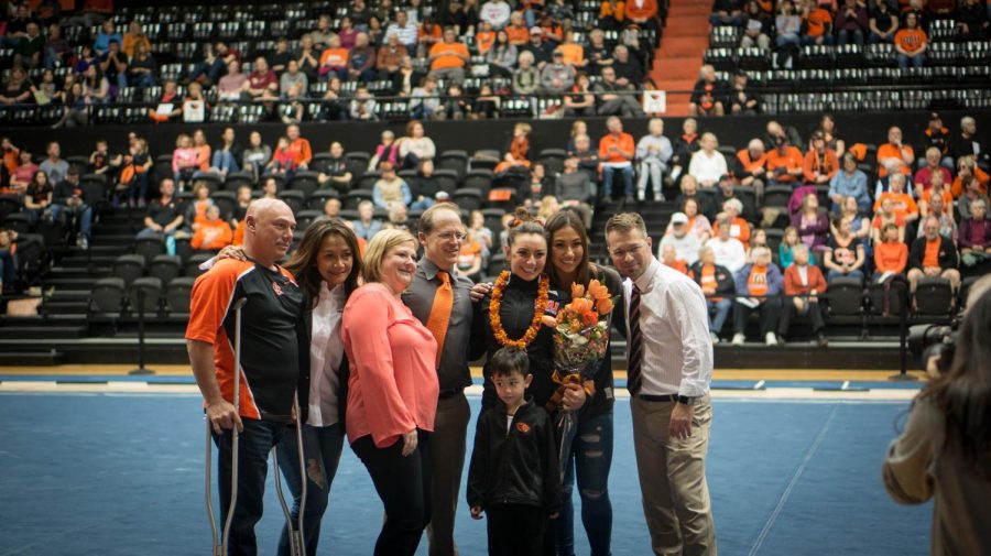 Erika Aufiero and her family celebrate her final meet at Gill Coliseum 