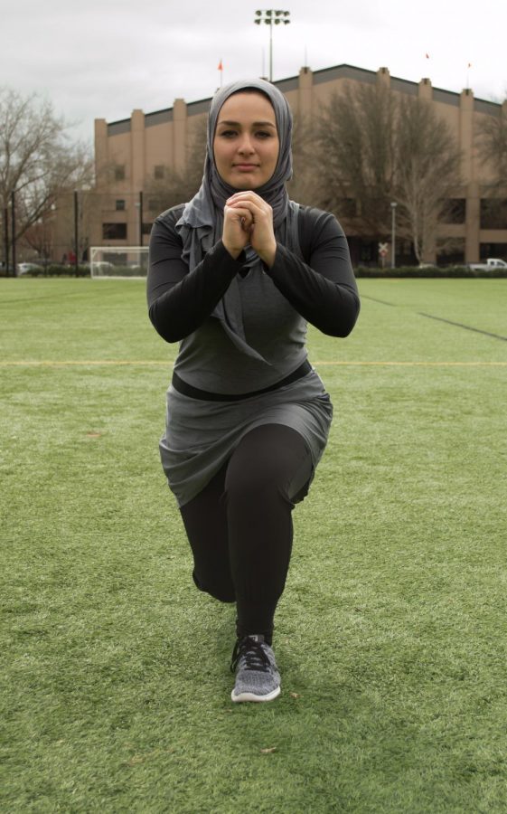 Corvallis community member Elhum Oskui lunges in the Student Legacy Park. Oskui is an avid member of Dixon Recreation Center and works to represent a dedicated, strong group of women at Dixon. 