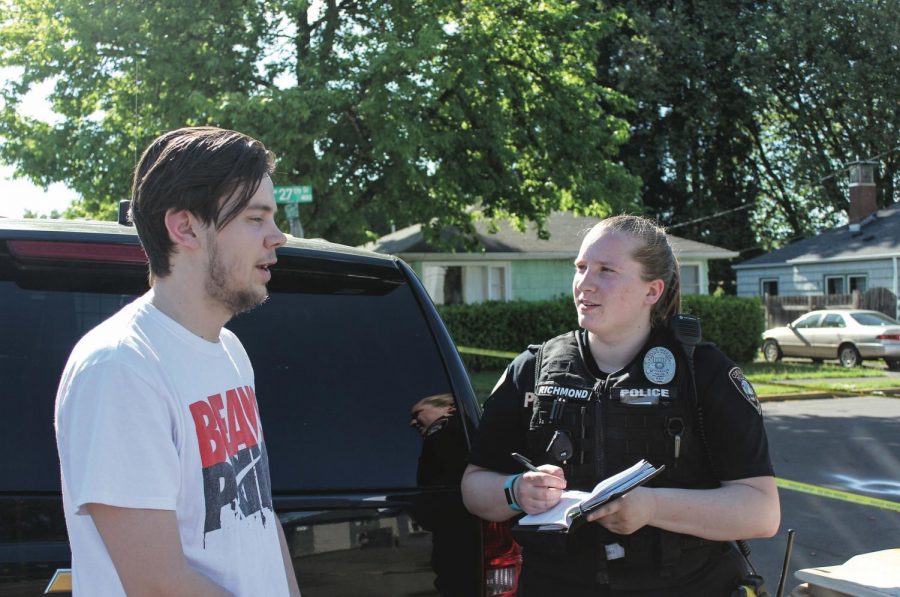 Nolan Butuso, one of the stabbing victims, recounts his experience with the incident to Corvallis Police Officer Lyssa Richmond the evening after the stabbing. The home in which the incident occurred has been released to the victims, but due to smoke damage and large amounts of blood, the residence is unlivable.