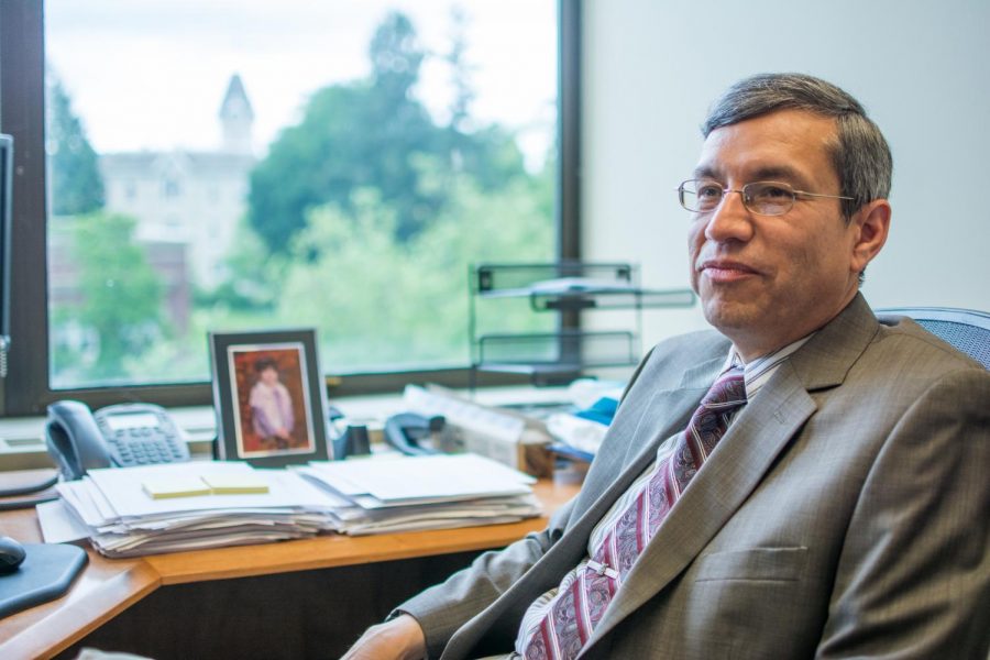 Salvador Castillo, the director of the Office of Institutional Research, sits in his office. Castillo believes that the frequent major changes can help students choose a major that is a good fit for them.