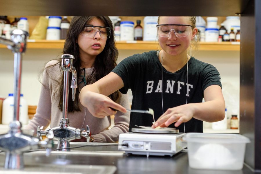 Students in the Discovering the Scientist Within program—a precollege program for middle school aged girls—work on a science experiment. Discovering the Scientist Within is one of several programs which attempt to excite young people about science.