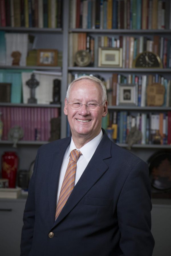 Oregon State University President Emeritus Ed Ray smiles in his office. Ray became the 19th president of OSU in 2003. 