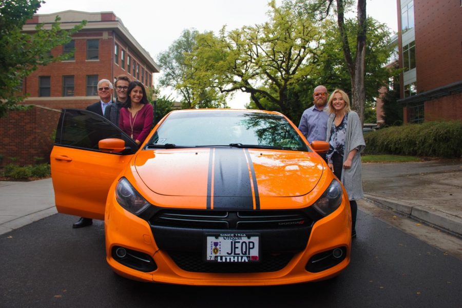 Corvallis mayor Bill Traber, ASOSU President Simon Brundage, ASOSU Vice President Rhadika Shah, Uber driver James, and first year business student Halle Higgins posing for a photo before taking the first official Uber ride in Corvallis. Higgins is the sister of Maddi Higgins, who was killed in a car accident in 2011, and is now an advocate for safe driving. 