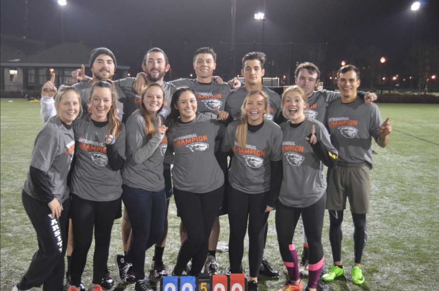 Co-rec champions Total Flag Football poses following their overtime victory against Varsity House to close out the fall 2017 intramural flag football season.