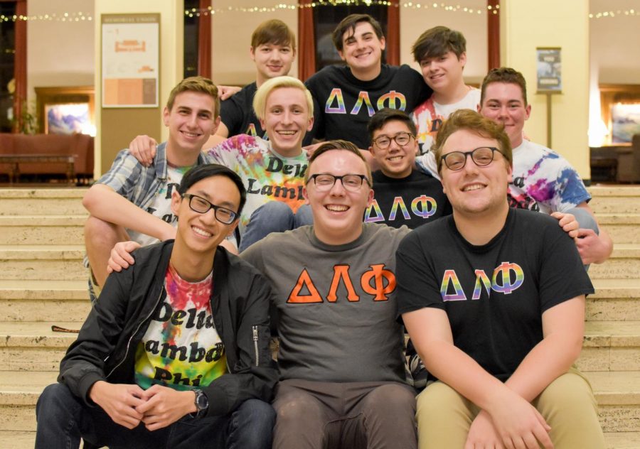 Members of the Delta Lambda Phi fraternity posing for a photo on the Memorial Union steps. Delta Lambda Phi originated in Washington, D.C. in 1987, and colonized at Oregon State University in 2015.