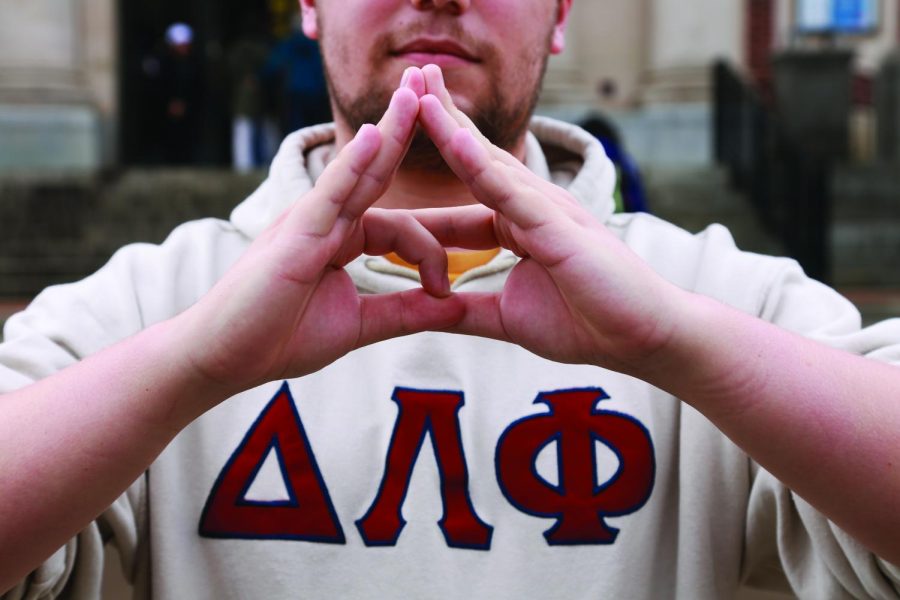 Delta Lambda Phi OSU colony founder Cory Zimmerman throwing what they know.