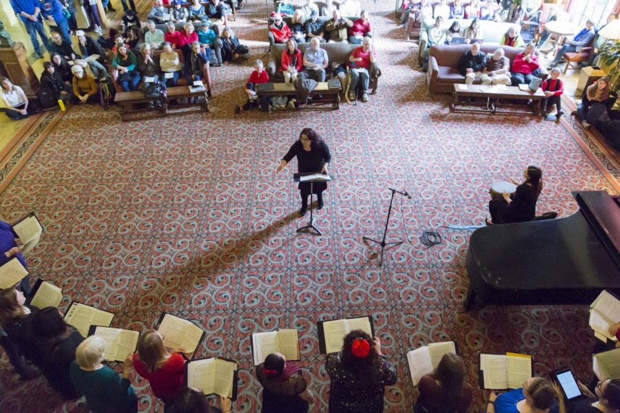 Director Sandra Babb conducting the OSU University Chorale at a Music a la Carte session in the Memorial Union lounge. 