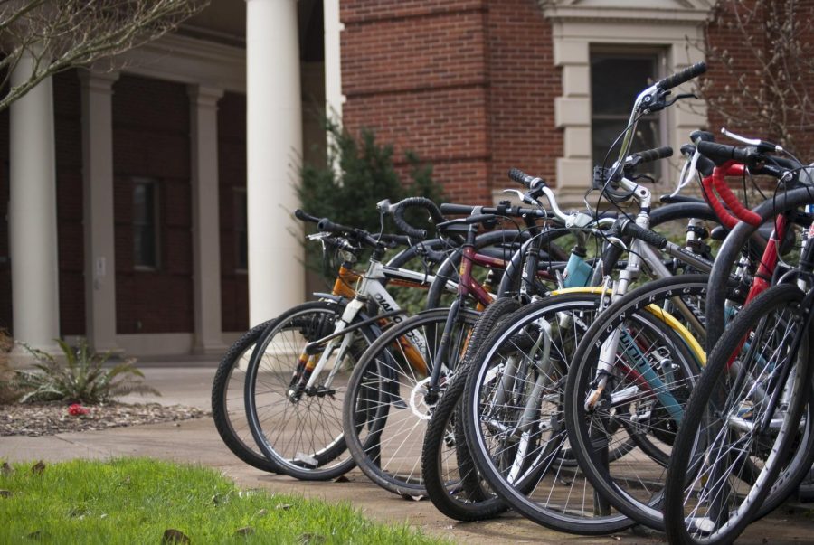 Bicycles+sit+outside+of+Weatherford+Hall.+Two+Pedal+Corvallis+bike+stations+are+available+around+campus+for+an+annual+or+individual+weekend+fee.