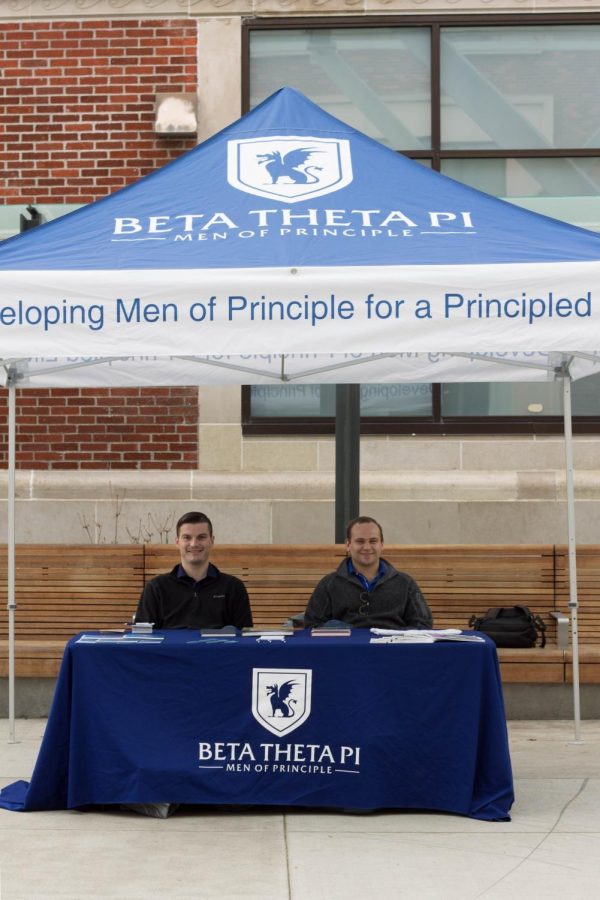 (Left) Heath Mountjoy and (right) Brian McKean recruit in the Student Experience Center Plaza.