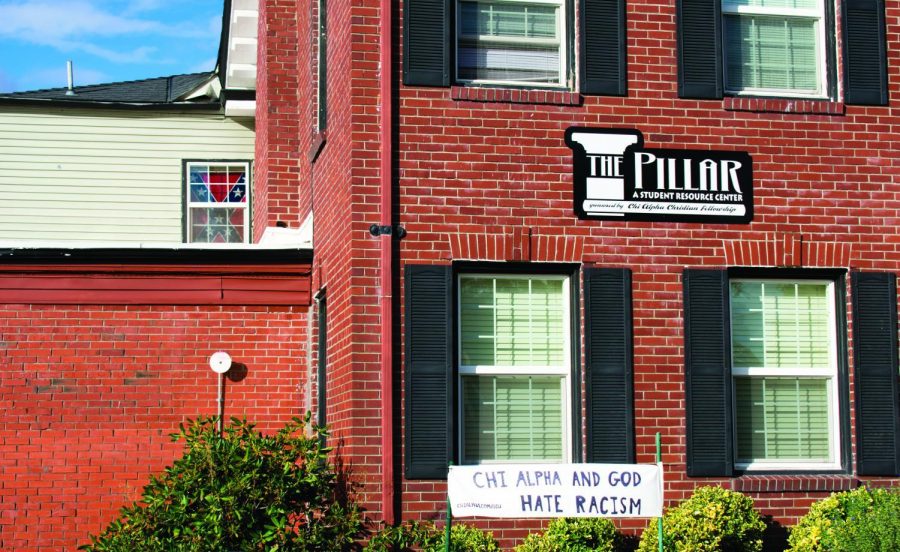 A Confederate flag has been on display in a window of Andrew Oswalt's room in The Pillar, a private men's co-op located across the street from the Lonnie B. Harris Black Cultural Center, since September of 2017. 