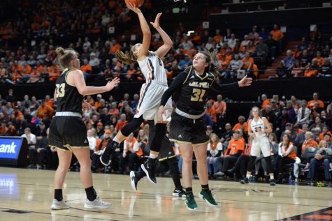 Junior point guard Mikayla Pivec goes up hard for the lay up. Pivec scored 15 points on the night, helping the Beavers to a victory in their home opener at Gill Coliseum. 