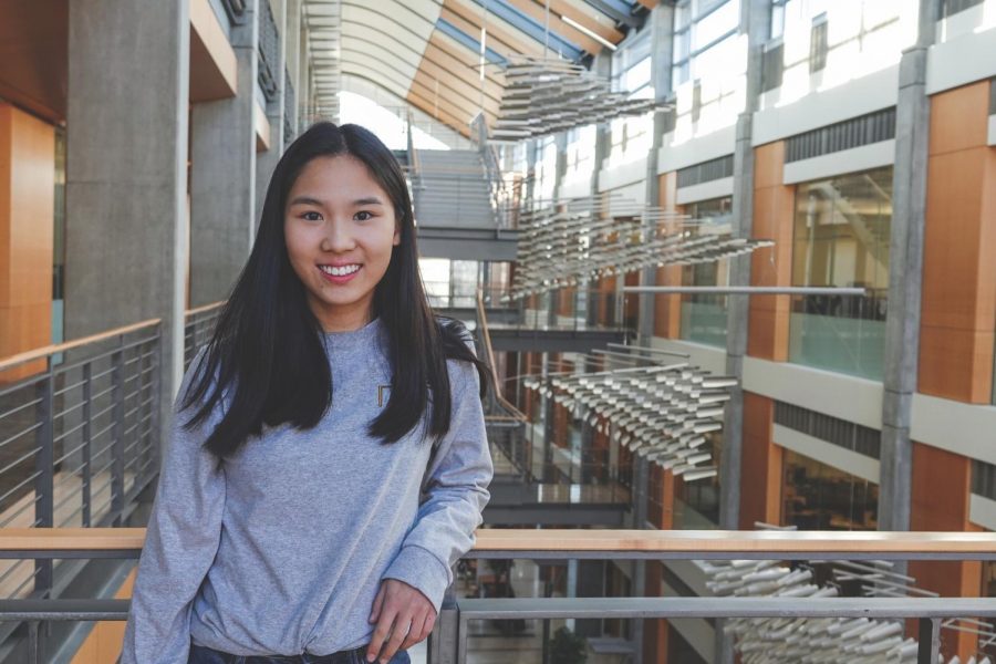 Iris Fu, the author of “Gateway to American Economics: An Introduction for Young Students on Their Way,” is 17 years-old and part-time student at OSU and at Crescent Valley High School. She is pictured here in Kelley Engineering Center, where she spent most of her time while producing the economics book.