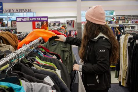 Lexi Strickland shops at the Goodwill on Ninth Street. Goodwill is a popular spot for students and Corvallis residents for fun sustainable and recycled items.