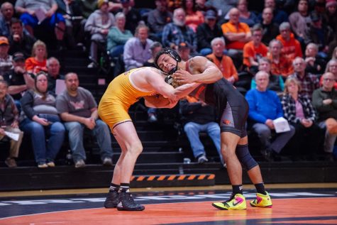 OSU redshirt junior Aaron Olmos battles against Wyoming redshirt freshman Cole Moody. Olmos secured the victory over Moody, one of Oregon State’s total four for the match against Wyoming.