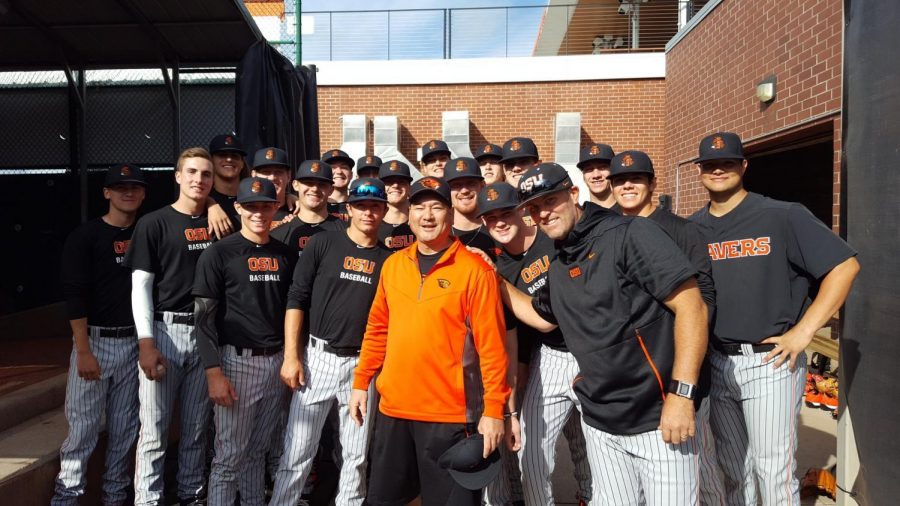Marvin Beaverman Yonamine poses with the OSU Baseball team on one of his visits to Corvallis, Ore. 