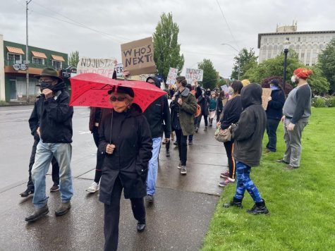Protesters chant black lives matter as they make their way through downtown Corvallis, Ore. this evening to denounce racism and recent police killings of African Americans in the United States.