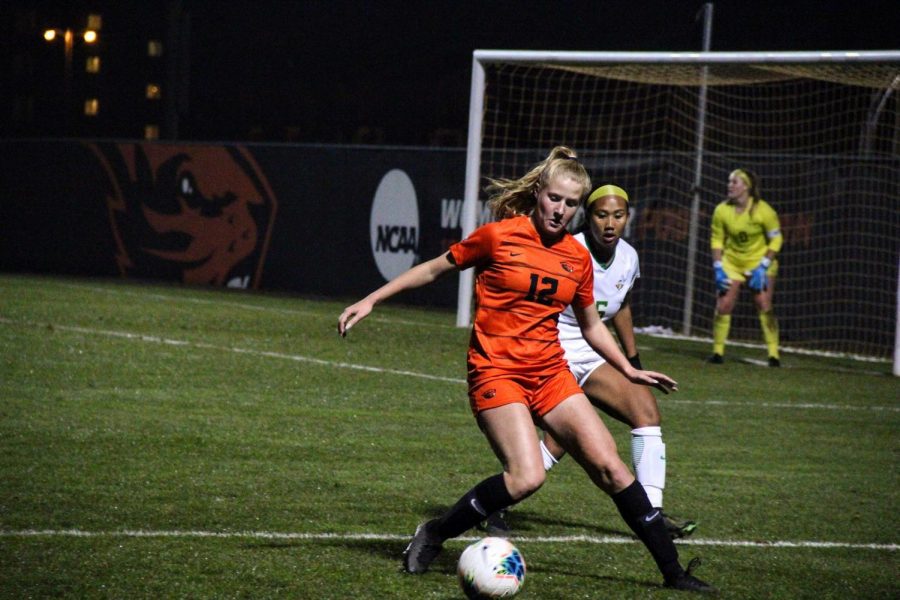In this file photo from 2019, freshman midfielder Abby Schwartz battles against an Oregon defender on Nov. 7 at Paul Lorenz Field. Schwartz earned Offensive Player of the Week honors in the PAC-12 for her efforts in Oregon State's victory then third-ranked Stanford Cardinal.