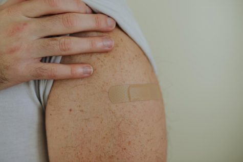 A photo illustration of what many OSU community members can expect when the COVID-19 vaccine becomes available: a band aid.