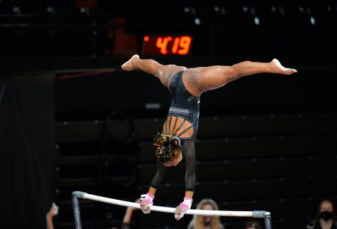 Senior Niya Mack performs her bar routine. OSU lost their first meet at home against Boise 194.250 to 191.950.