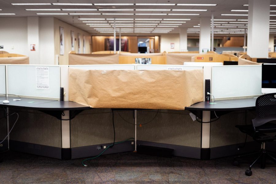 A closed off computer station creates six feet of distance between students at the OSU Valley Library.  The Valley Library computer lab is open by reservation only from 10am-5pm, Monday-Friday. 