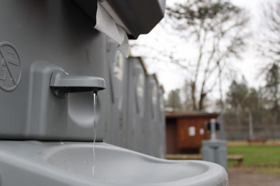 A+pump+activated+hand+wash+station+is+picture+are+Pioneer+Park+for+public+use.+With+hygiene+being+one+of+the+hardest+things+to+maintain+when+struggling+with+homelessness%2C+the+city+of+Corvallis+has+provided+ways+for+the+populations+at+Pioneer+Park+to+stay+clean.