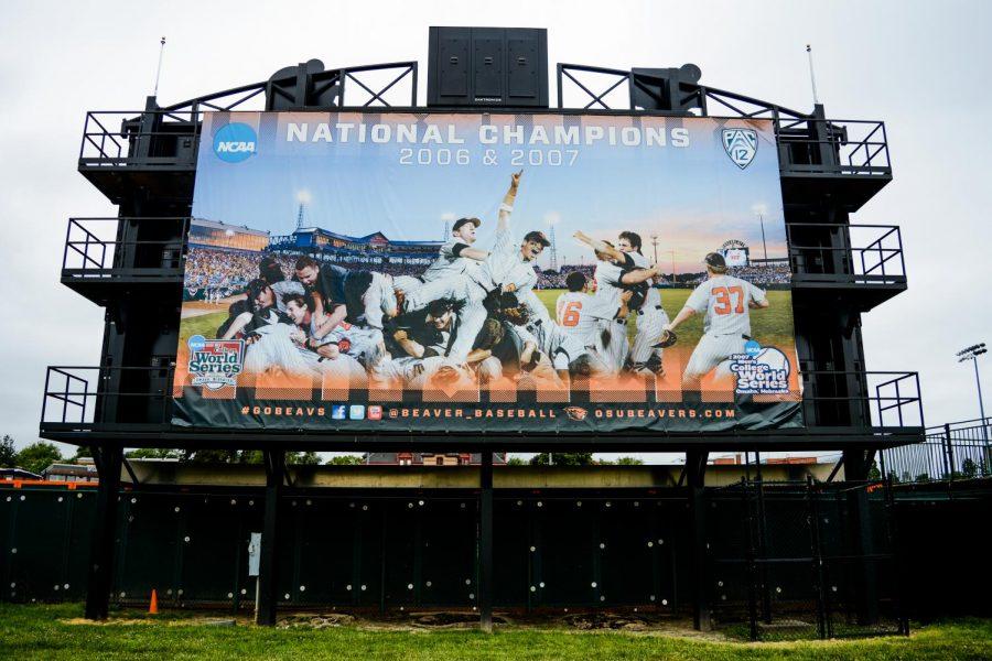 In this file photo from 2017, a banner hangs outside of Goss Stadium celebrating the College World Series wins of the 2006 and 2007 Oregon State Beavers. Oregon State’s 2006 championship win was their first in school history. 