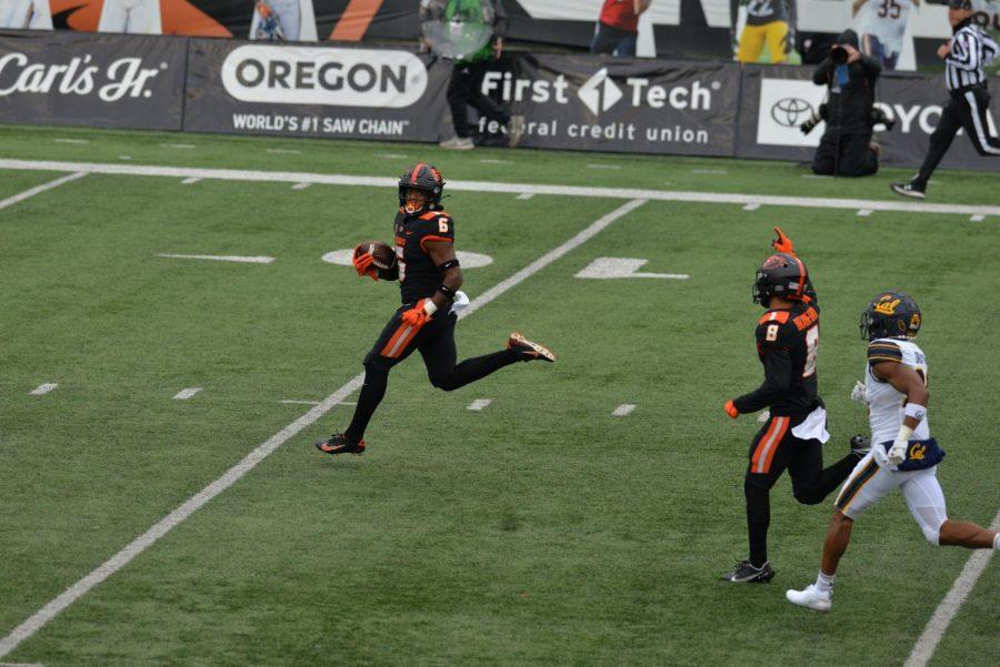 In this photo from Nov. 21, 2020, Oregon State University running back Jermar Jefferson looking back while breaking open a 75 yard touchdown for the opening play. With Jefferson declaring for the NFL draft early, new running backs coach AJ Steward will look to replace the NFL hopeful in the Beavers offense.