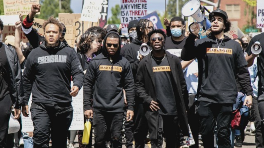 A group of Oregon State University student-athletes lead a protest for Black Lives Matter on June 7, 2020. Although Juneteenth is now a recognized holiday at OSU and federally in the United States, the institution still has significant work to do for Black liberation, according to Madison Ellsworth, a fourth-year business management student and co-president of DamChange.