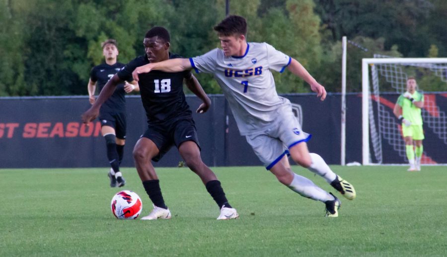 Beaver senior midfielder Tyrone Ntsabeleng fights to maintain possession of the ball from the opposing midfielder Sam Fletcher of UC Santa Barbara. Only moments later Ntsabeleng would be laying on the field from suffering a minor injury. 