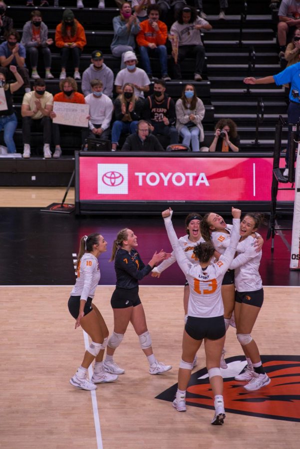 The OSU women's volleyball team celebrating after scoring a point against the No. 17 Stanford Cardinals on October 8. The Beavers would fall to the Cardinals, losing 3-0. 