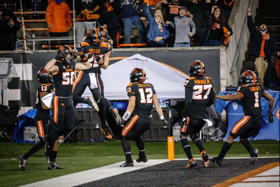 The Oregon State football team celebrating sophomore tight end  Luke Musgrave blocking a punt returned for a touchdown against the University of Utah Utes on October 24 at Reser Stadium. The Beavers would go on to defeat the Utes by a score of 42-34, getting their fifth win of the season. 