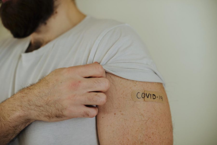 A file photo illustration depicting someone with a Bandaid reading COVID-19 to depict the experience of receiving the COVID-19 vaccine. Benton County has been experiencing a modest rise in COVID-19 cases since the lifting of the mask mandate across the state of Oregon.