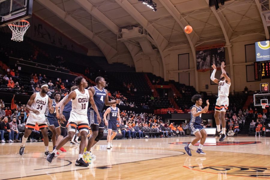 Oregon State senior forward Maurice Calloo shooting a three-point shot against the Samford Bulldogs in Gill Coliseum on Nov. 19. The Beavers would lose to Bulldogs by a score of 77-78. 