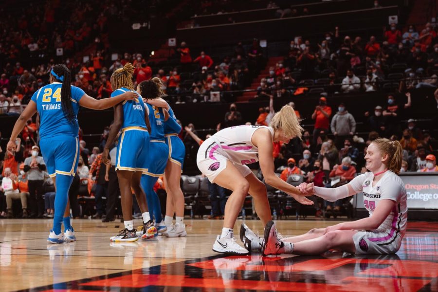 Ellie Mack is caught smiling after a tough basket on a contact play against the UCLA Bruins on Jan 30, 2022 inside Gill Coliseum.