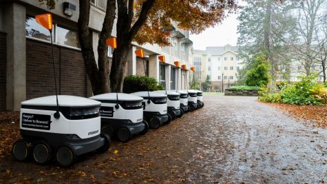 Starship robots await loading of food outside of the Arnold Dining Hall on Nov. 24, 2021. These robots deliver food to students from most dining locations on Oregon State University’s Corvallis, Ore. campus and are not expected to be impeded by the winter weather.