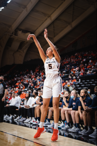 Oregon State redshirt-junior forward Taya Corosdale taking a three-point shot against the Arizona Wildcats in Gill Coliseum on Jan. 13, 2022. Despite Corosdale finishing with a career-high 19 points, the Beavers would fall to the Wildcats by a narrow score of 55-53. 