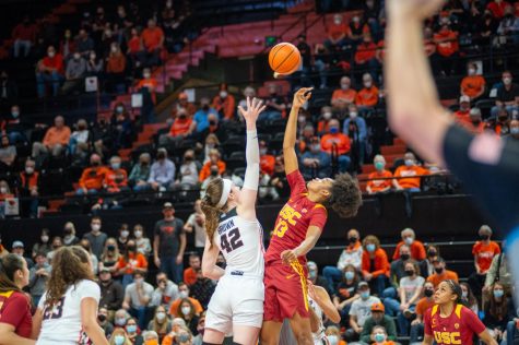 Oregon State sophomore forward Kennedy Brown tips off with a USC player to start their overtime round against USC on January 28, 2022. Browns last minute shot would give the Beavers the victory over the Trojans by a score of 63-61. 

