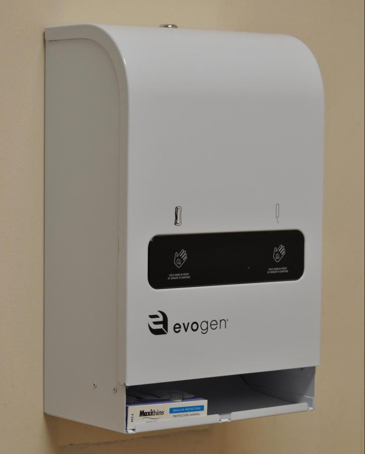 A free tampon and pad dispenser can be seen in s single user restroom on the first floor of Waldo on Jan. 14. OSU is starting to install free tampon and pad dispensers across campus due to the Oregon Menstrual Dignity Act.