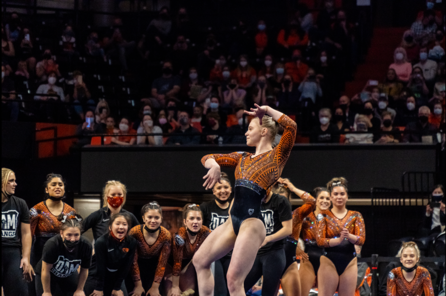 Olympic gymnast Jade Carey scans the crowd with a smile on her face during her floor routine which would earn here a perfect 10 at the gymnastics meet against University of Washington on February 13, 2022
