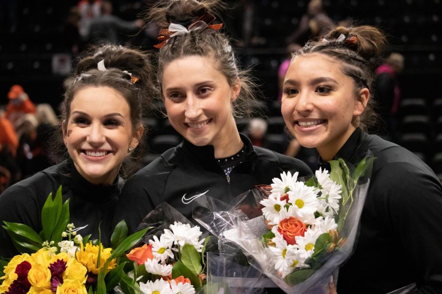 Oregon+State+senior+gymnasts+Kaitlyn+Yanish%2C+Alexa+McClung%2C+and+Colette+Yamaoka+%28left+to+right%29+posing+for+a+photo+on+senior+night+in+Corvallis%2C+OR%2C+on+February+25%2C+2022.+The+Oregon+State+Beavers+won+the+meet+against+the+Stanford+Cardinal+by+a+score+of+197.225-195.05.