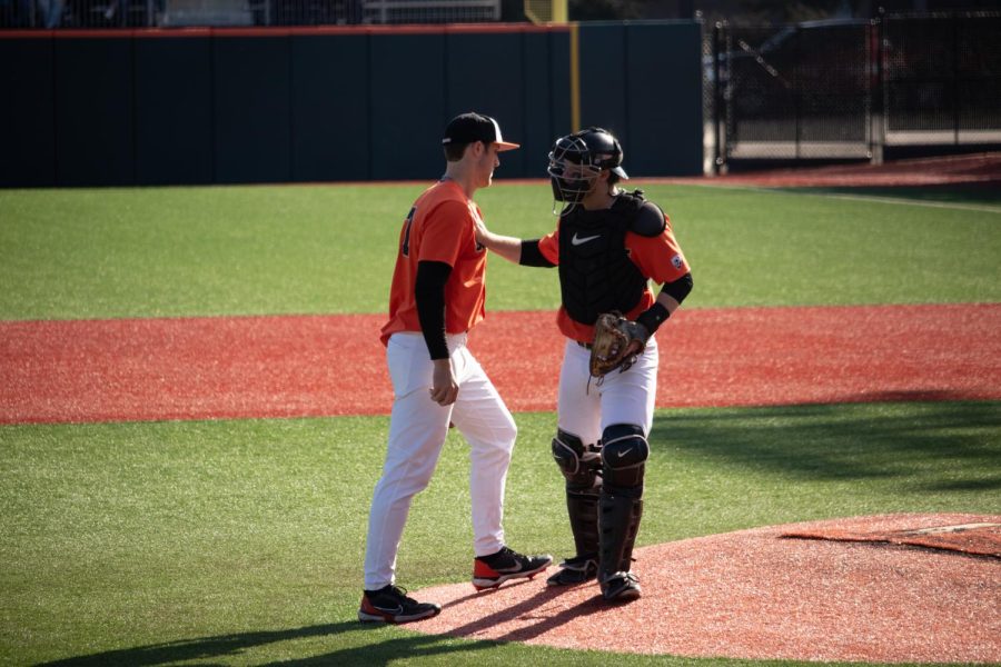 Oregon State sophomore pitcher Jayson Hibbard (left) talks to Oregon State junior catcher Gavin Logan (right) during the UC Irvine game at Goss Stadium on March 6, 2022. The Beavers would lose this game by a score of 3-2, and suffer their first loss of the season.
