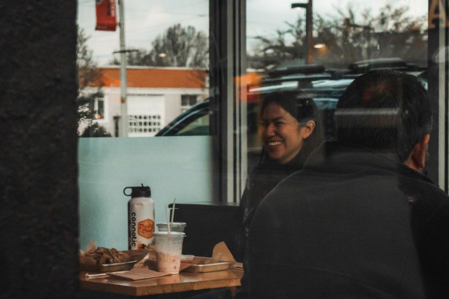 OSU student Maria Moreno enjoying local businesses in downtown Corvallis, Ore. on Feb. 14. Local businesses are being recognized during the Celebrate Corvallis event on March 18, which can help bring awareness from the public about these businesses. 