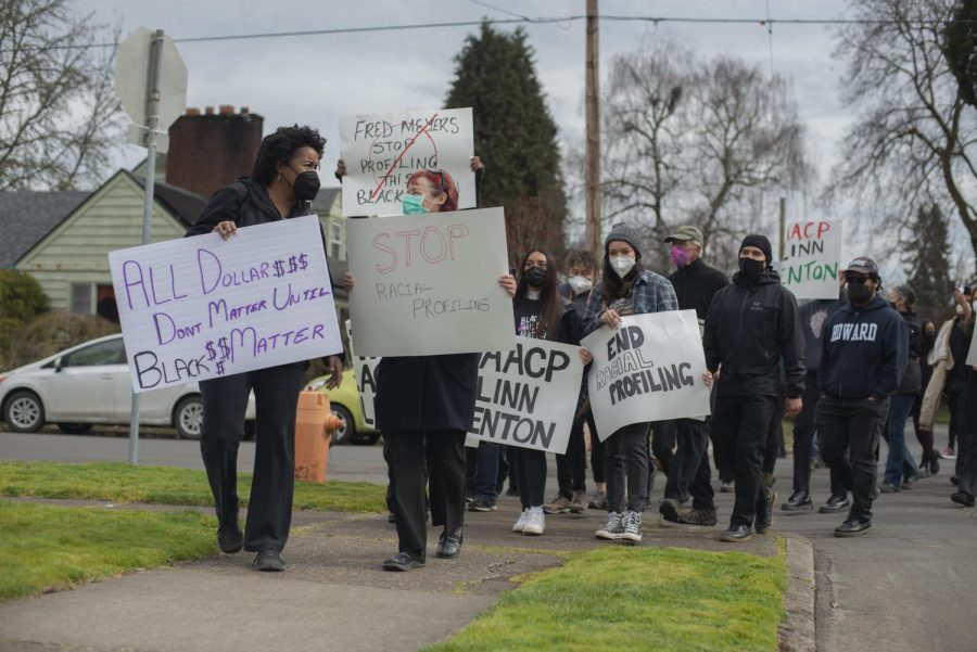 A group marches to Fred Meyer in Corvallis, Ore. on March 12 to end reports of racial profiling experienced by Black women at the store. Linn Benton NAACP has made a list of four demands to both local and national Fred Meyer stores as solutions to racial profiling.
