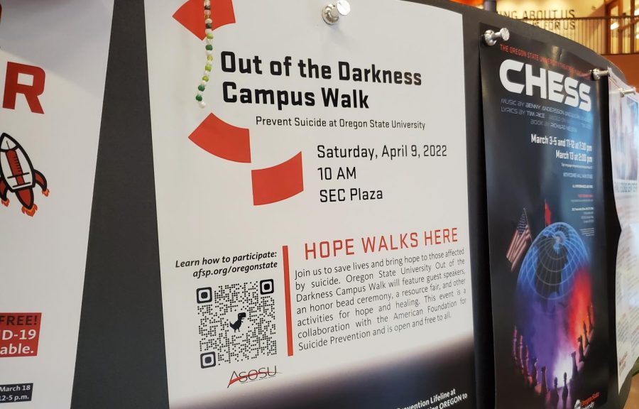 The flyer for the Out of Dark walk can be seen educating the OSU community about the walk in the Student Experience Center. The event will feature a 22 push-up challenge to honor veterans, guest speakers, and an honor bead ceremony. 