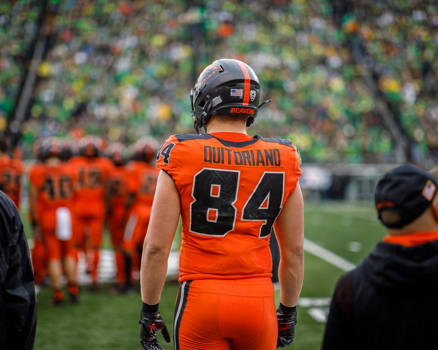 Oregon State tight end Teagen Quitoriano looks at the huddle against the University of Oregon Ducks on Nov 27, 2021 in Eugene, Ore. Quitoriano was selected to the Houston Texans with the 170th pick in the 5th round of the 2022 NFL Draft. 