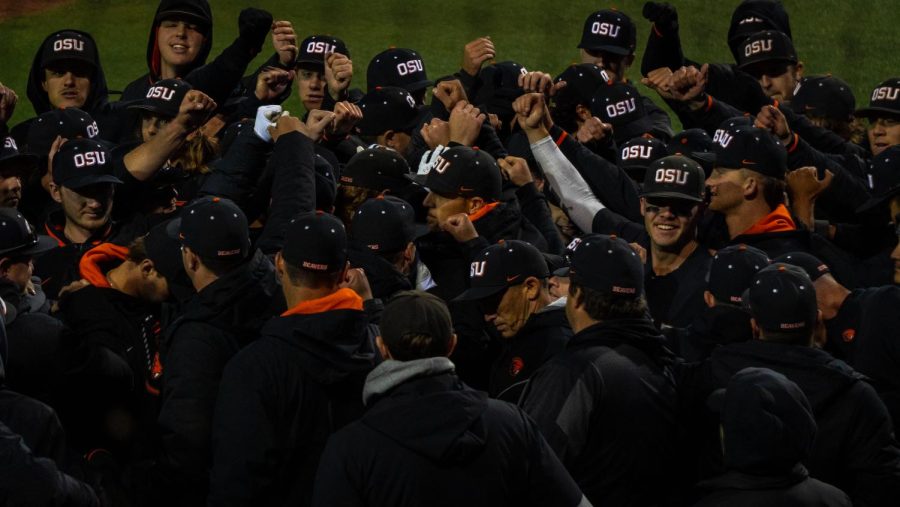 Celebrating+the+series+opening+win%2C+the+Oregon+State+Baseball+team+came+together+to+break+the+team+huddle+inside+of+Goss+Stadium+on+April+14%2C+2022.+The+Beavers+won+the+first+game+of+the+series+against+Long+Beach+State+3-1.